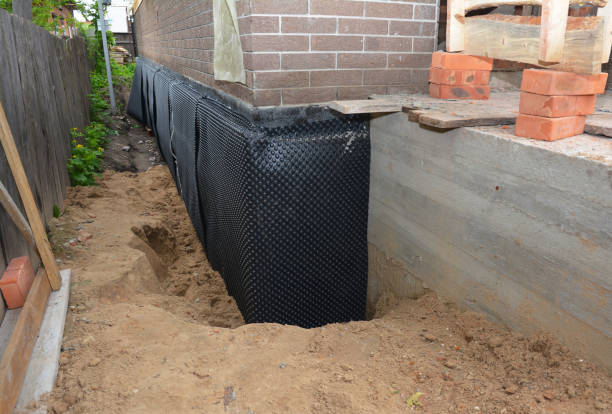 Happy homeowners after waterproofing job in Sequatchie